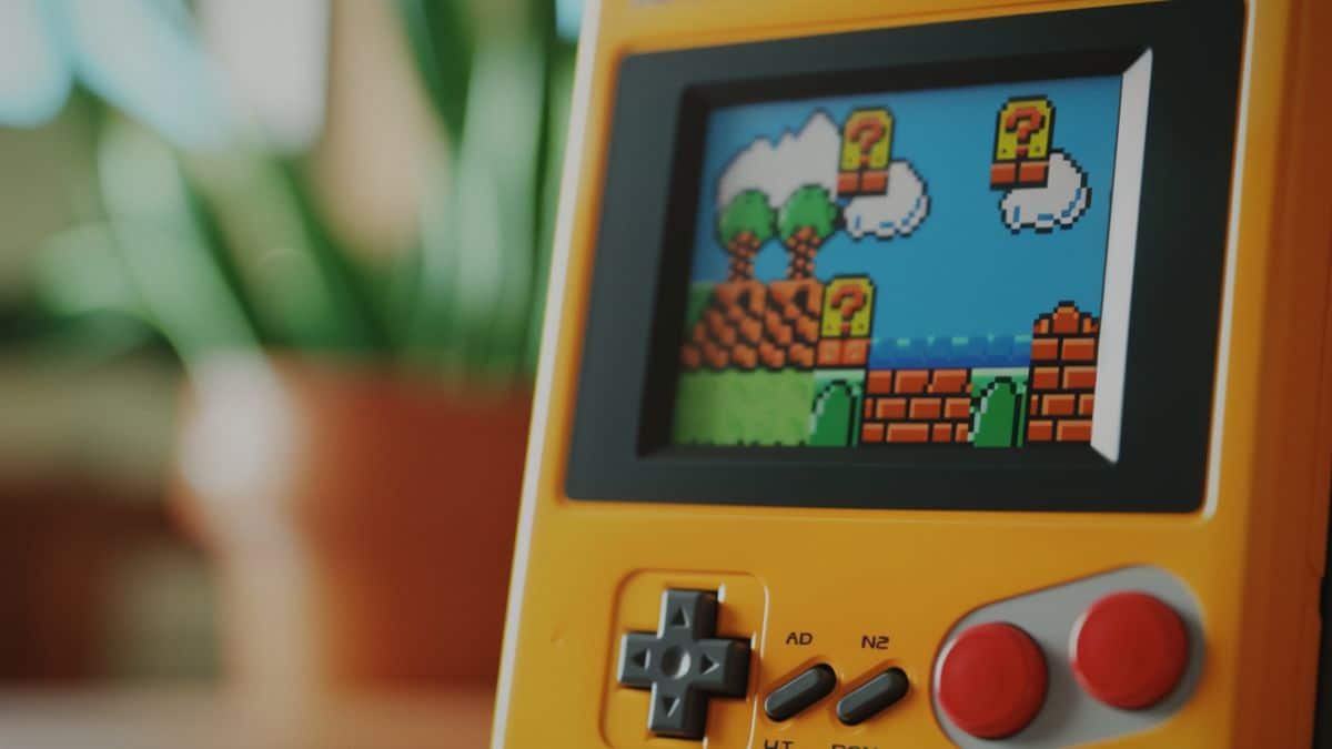 Closeup of the iconic Super Mario Land gameplay on a small screen.