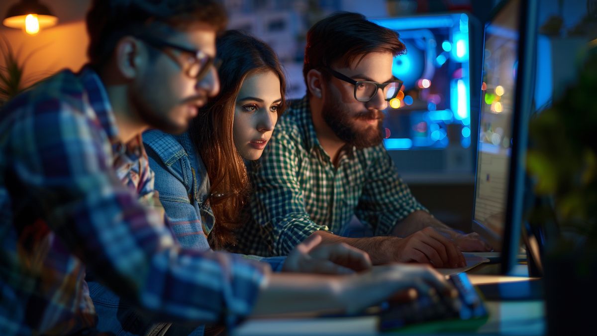 Group of developers working on a multiplatform software project at Nintendo.