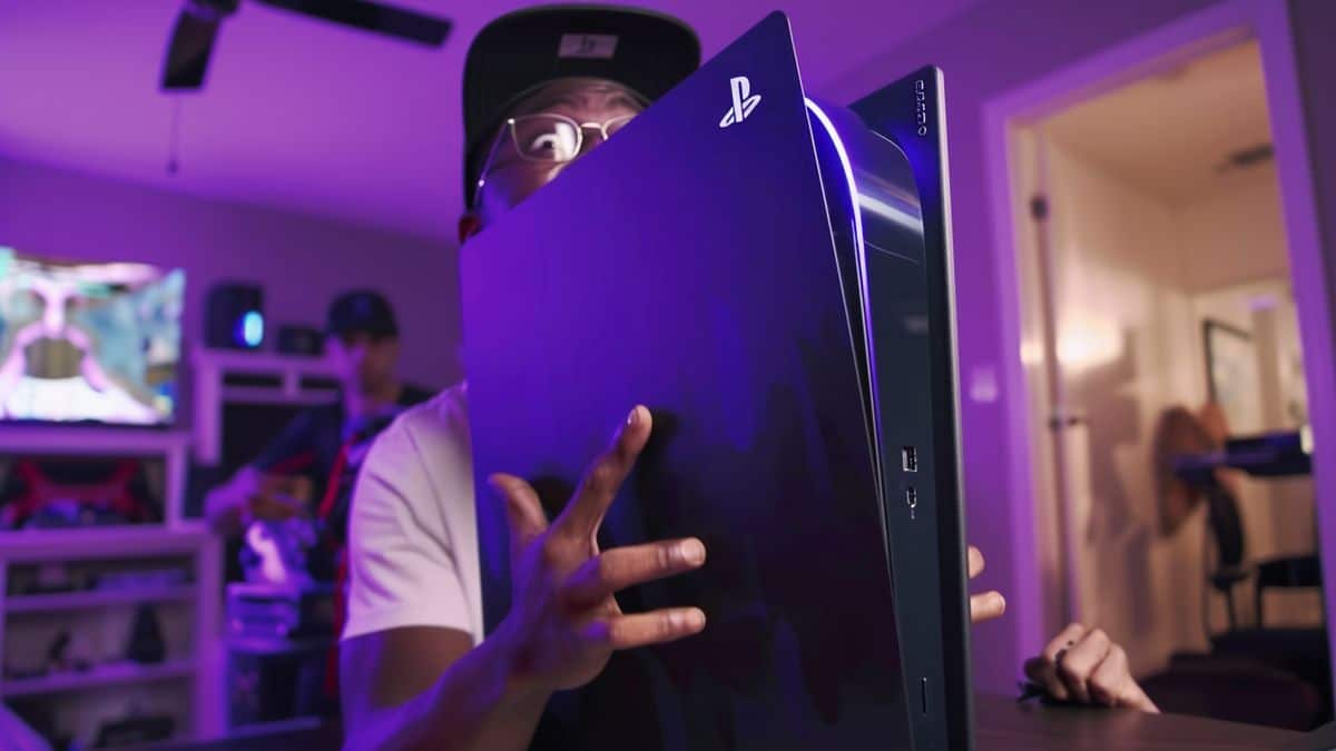 Excited gamer unboxing the new PSPro console.